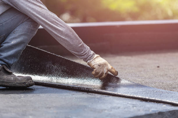 Professional Basement Waterproofing technician working in Richmond, IN